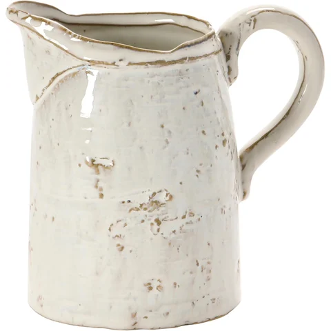 Creative Co-Op 28 oz Stoneware Pitcher: a rustic white stoneware pitcher. pour from it or fill it with stems.