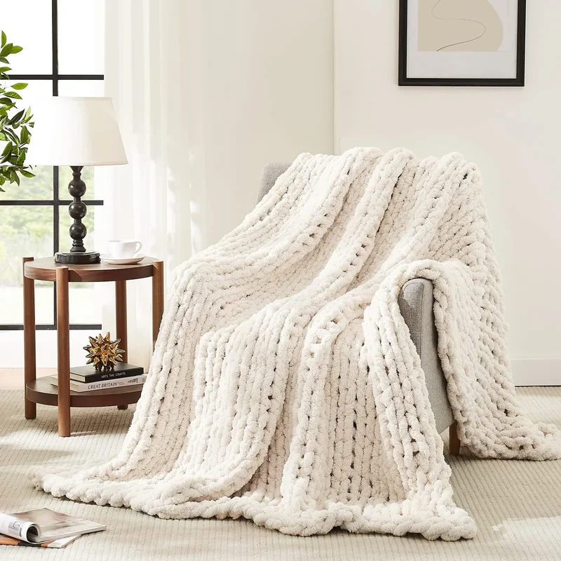 L'AGRATY Chunky Knit Throw: a handmade chunky knit throw in soft ivory chenille. couch season.