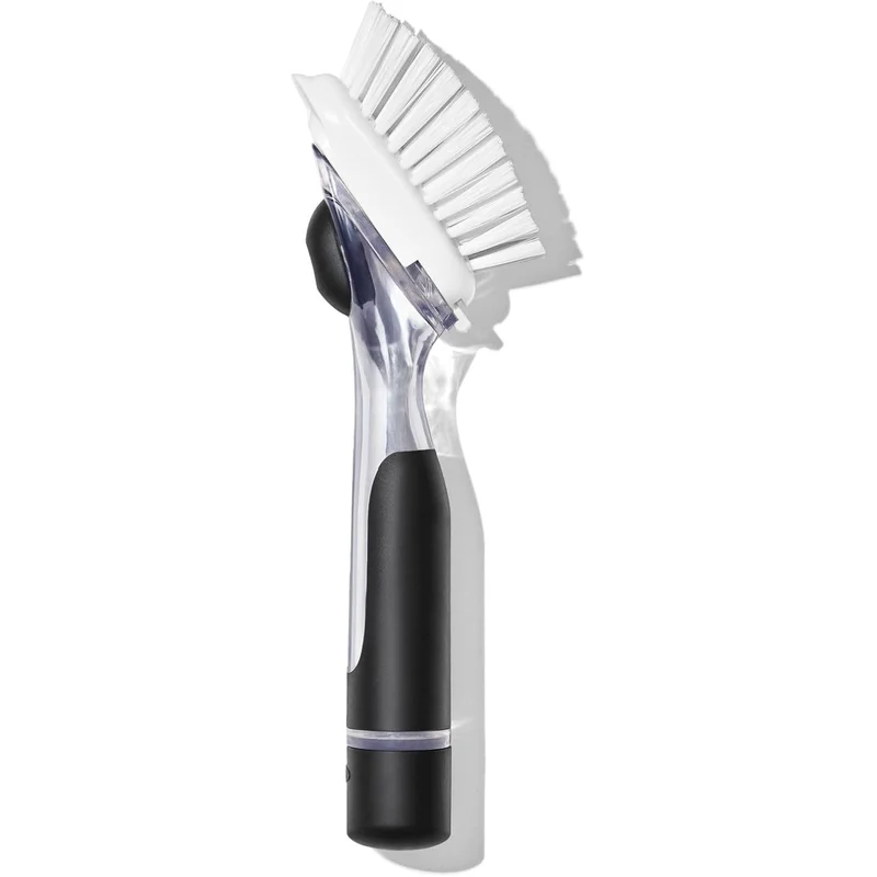 OXO Good Grips Soap Dispensing Dish Brush: soap lives in the handle. press and scrub.